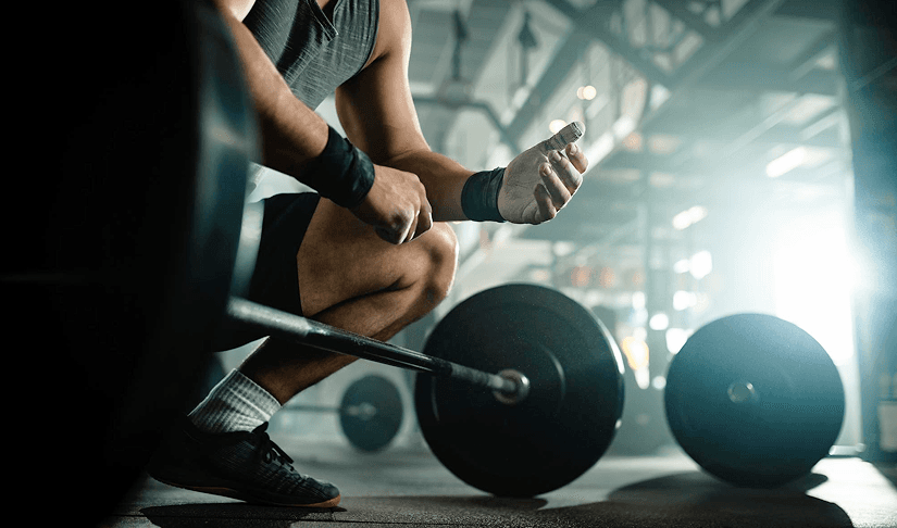 Man training in a gym representing peak performance with Sermorelin